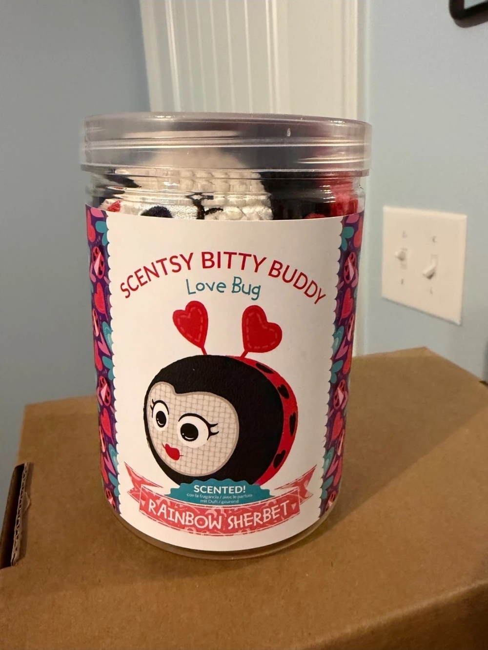Scentsy Bitty Buddy Love Bug - Rainbow Sherbet Scented Plush (Pink/Red/Black)